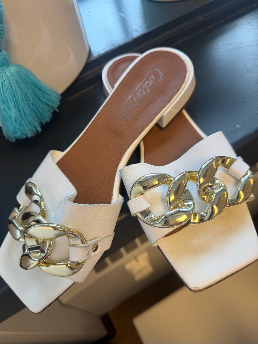 L'INTERVALLE White Slide Mules with Gold Chain Detail